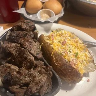 Steak pieces baked potato