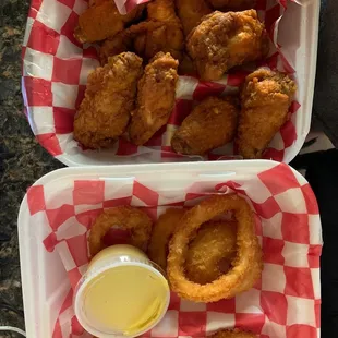Hot chicken wings and the best onion rings