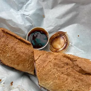a sandwich and dipping sauce