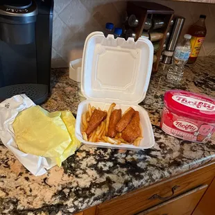 Two beef tacos fish and chips Thrifty'sstrawberry ice cream