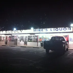 a truck parked in front of the store