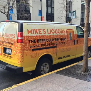 a van parked on the side of the street