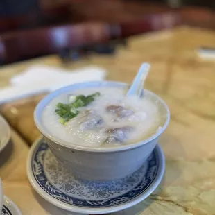 Preserved Egg And Pork Congee with salted egg