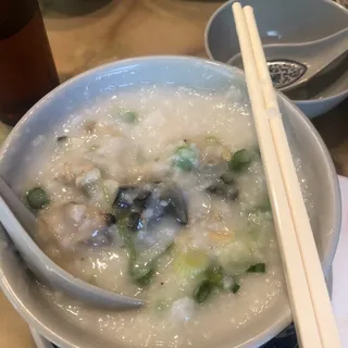 A11. Clam Meat with Preserved Egg and Salt Egg Congee