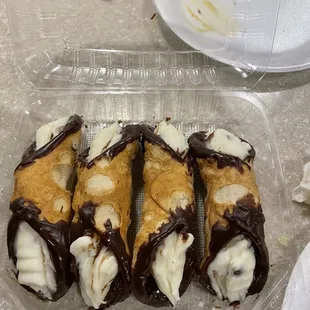 Cannolis with ends dipped in Nutella. Not bad for 10 bucks for 4.