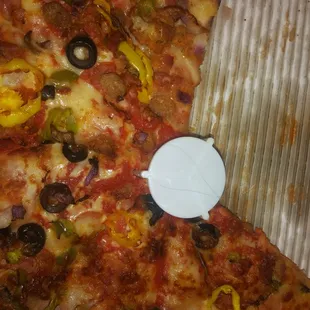 Blue hair that I pulled out the pizza.