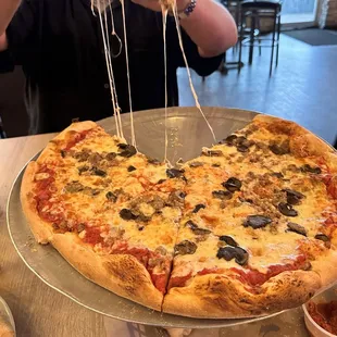 18" sausage and mushrooms pizza.