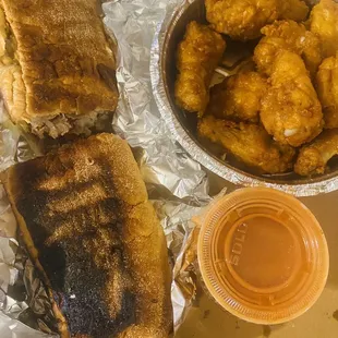 A burnt Hero and wings not cooked well.