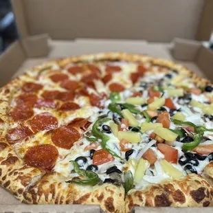 Large half pepperoni half veggie with pineapple added !