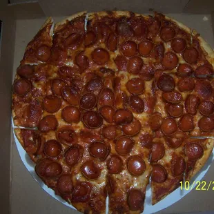a pepperoni pizza in a box