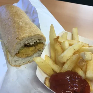 Small oyster po-boy with fries.