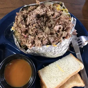 Brisket stuffed loaded baked potato