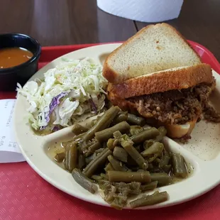 This was the Tuesday special! Texas toast! Chopped meat with bbq sauce, green beans and cole slaw! Delicious and priced right!
