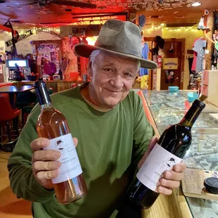 Wine maker with his delicious local wine