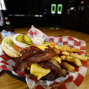 Bacon Cheeseburger with the BEST fries! Check out Mike&apos;s Speedway Bar and Grill for great bar food experience.