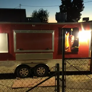 a taco truck parked in a parking lot