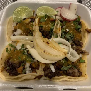 Tacos de asada and pastor mixed meats.