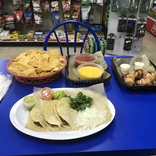 Tacos, chips, salsa, bacon wrapped jalapeños stuffed with Chorizo...plus tip, $29.