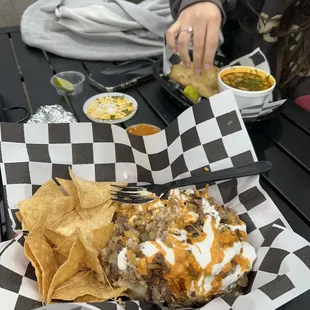 Loaded Potato , crispy beef tacos with consomé