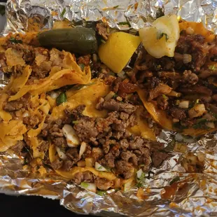2 asada, 1 chorizo, 1 al pastor. Al pastor ain't al pastor. Asada=tough. Chorizo=gross. 1 cup of salsa 4 tacos. Barely any onion/cilantro.