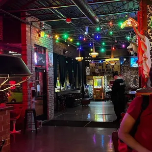 a woman sitting at a bar