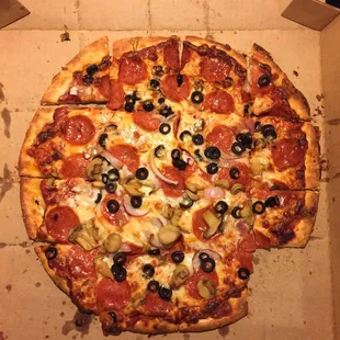 Pepperoni, onion, black olive. Mushrooms on half. Welcome to Springfield.