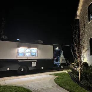 a food truck parked in front of a building