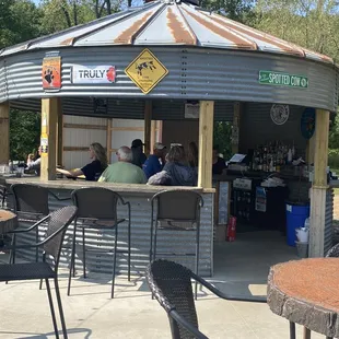 Awesome patio!  Adorable patio bar!  Came today with friends for the live music: Chrome Wheels band, they were great!