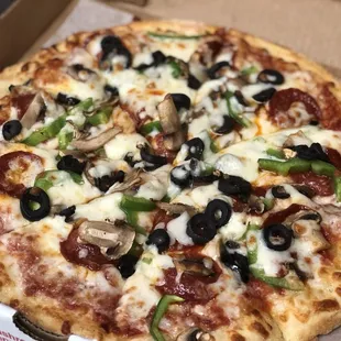 Green peppers, black olives, mushrooms and pepperoni