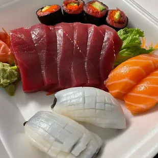 Yum! Tuna sashimi, squid sushi and fresh salmon sushi