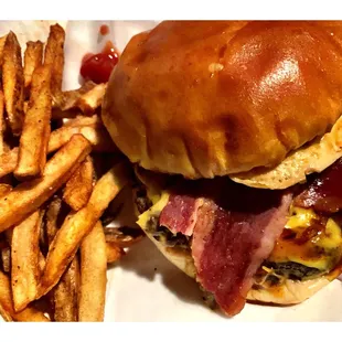 The Hebrew Burger( Grilled Angus Beef Burger Egg Turkey Bacon Grilled Mushrooms Melted Cheese &amp; Rico&apos;s Sauce. Go w/Fries. Pretty Good!