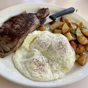 Top sirloin and eggs with home fries yum!