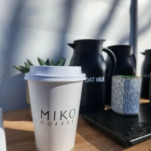 a coffee cup on a table