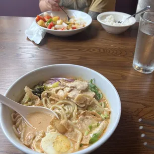 Kao Soi Noodles with chicken and the sweet and sour with tofu.