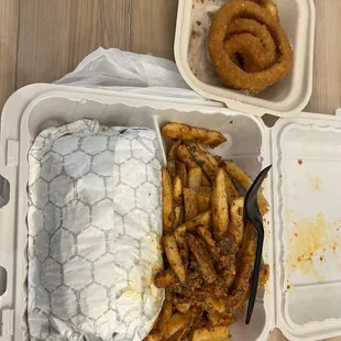 Super Gyro Plate with geek fries and onion ring.