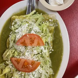 Cheese enchiladas with green sauce. Ask for the potatoes and carrots when not getting meat.