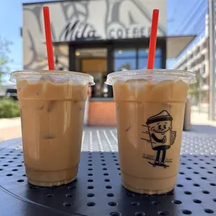 Left is iced latte with caramel and left is iced latte with vanilla syrup.