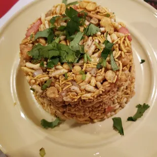 Some sort of sweet puffed rice dish. I don&apos;t remember what it&apos;s called but it&apos;s quite tasty.