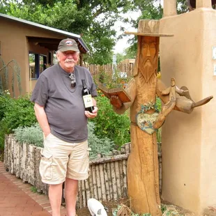 Larry and San Francisco de Asis at the garden entrance