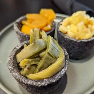 Flight of pickles: cactus, peaches, and pineapple