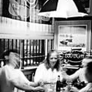 a group of people sitting at a table