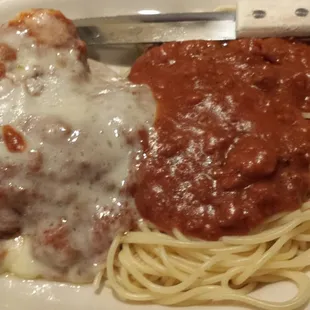 Chicken was tender and tasty (if not cooked in the style of chicken parmesan ) and meat sauce was horrible.