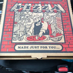 a pizza box in the back of a car