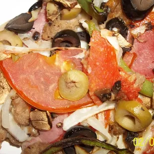 Supreme Pizza. Close-up of toppings. Really, there's a lot of stuff on there.