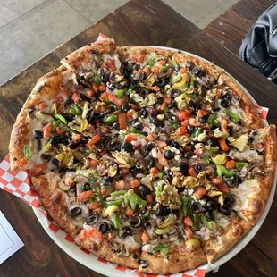 a large pizza with various toppings