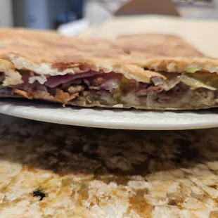 There is very little of anything inside this wedgie and the dough is thin.