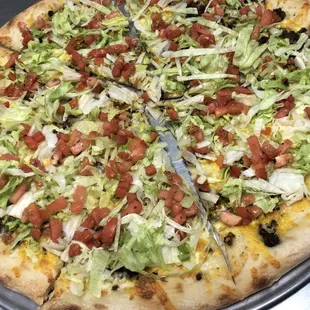 If you can't decide between and pizza and a cheeseburger, we will give you both!!