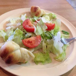 Side salad and garlic knots that came with a side of cheese pizza &amp; drink for  the lunch special for $6.99