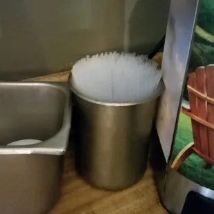 The yummy bucket of unwrapped straws.