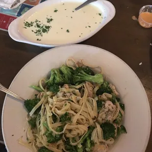Fettuccine Alfredo with sauce on the side and steamed broccoli added.